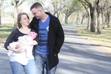 Beautiful Couple With Newborn 